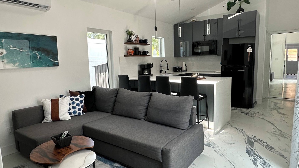 Bay Acres House | Private guest house with king bed & loft. Deck with hot tub and putting green