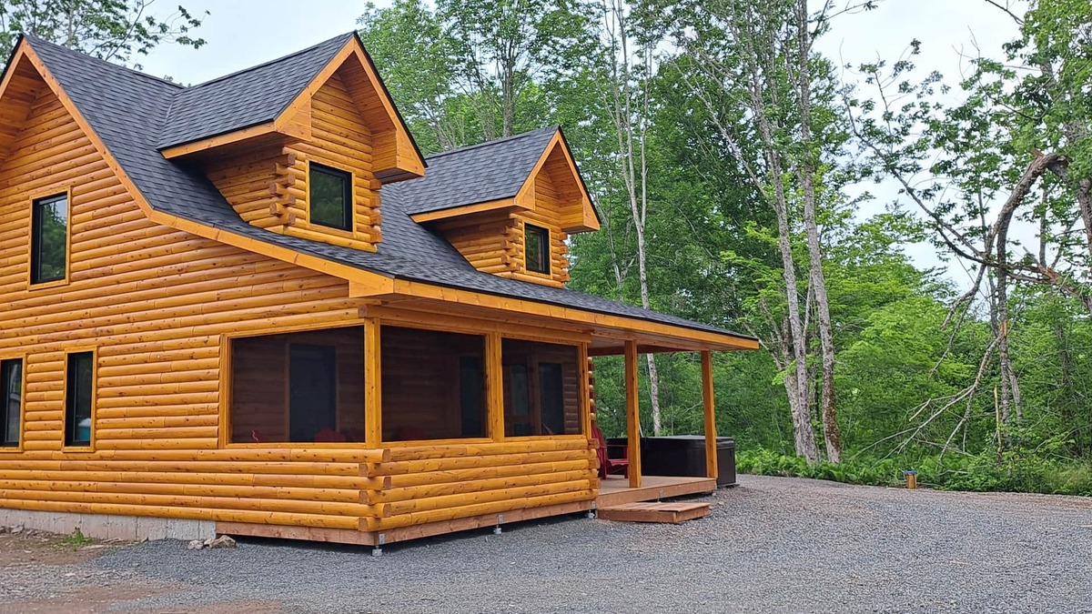 Antigonish County Cabin | Private lakefront log cabin with year-round hot tub.