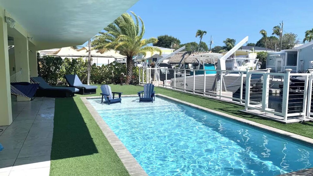 Key Largo Village House | Private Waterfront Home – with Heated Pool & Boat Dock