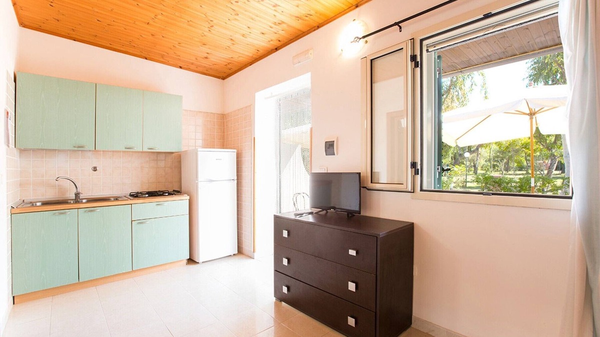 Chiesiola Resort | Property in a Holiday Village 'Baia Falcone - Comfort 210' with Sea View and Air Conditioning