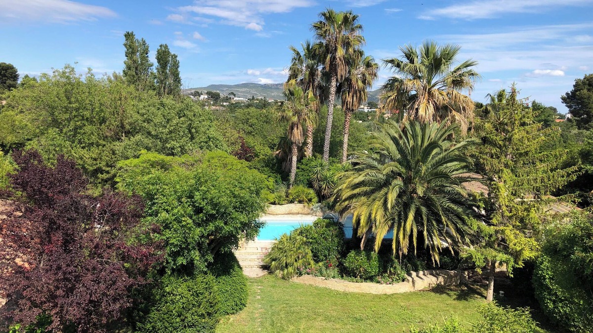 Chateau Gombert House | Property with swimming pool, garden and sports field.