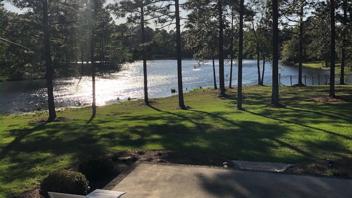 Jesup House | Quiet lake front property in peaceful neighborhood setting.