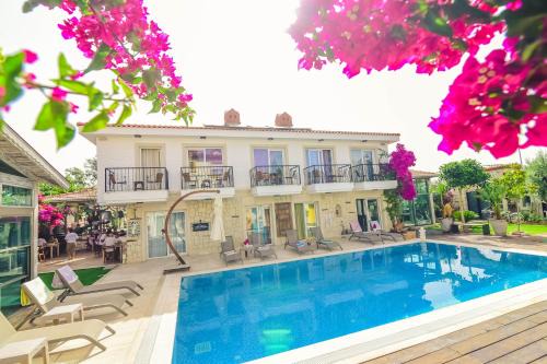 Tokoglu Hotel | Rüzgargülü Otel