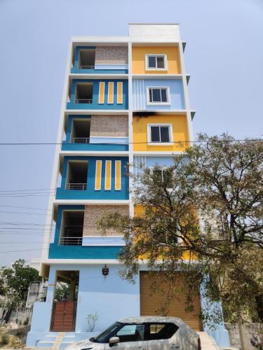 Tirupati House | RAK Homestay - Luxury AC 2BHK Apartments for family stay - Walkable to PS4 restaurants -Equipped Kitchen - WIFI - Android TV - Near to Tirumala fly over starting point -Near to National Highway