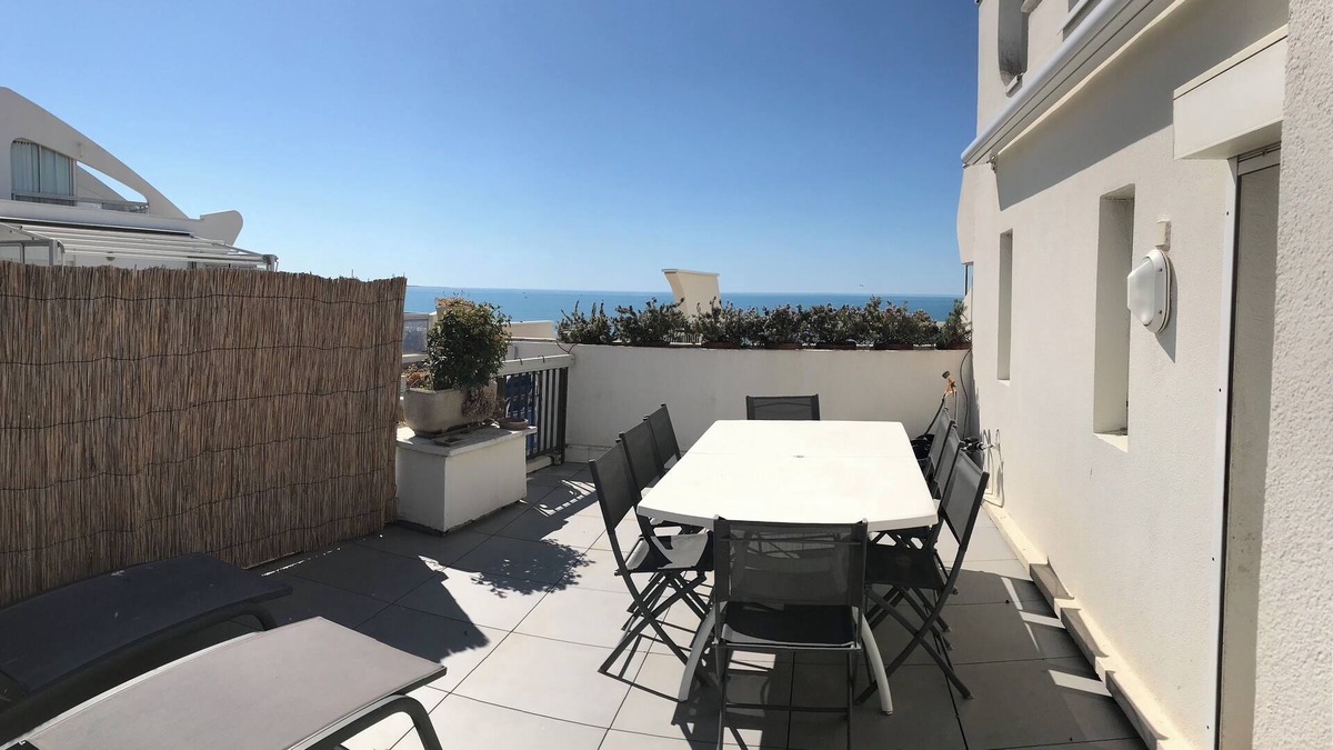 Le Couchant Apartment | Rare Seafront la Grande Motte 4 people large terrace top floor.