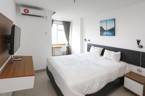 Cikarang Apartment | RedLiving Apartemen Enviro Cikarang - Stars Rooms