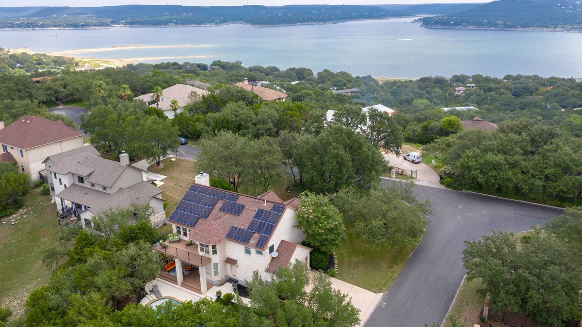 Travis Landing House | Relax in our beautiful backyard pool. Hop on Lake Travis at nearby marinas