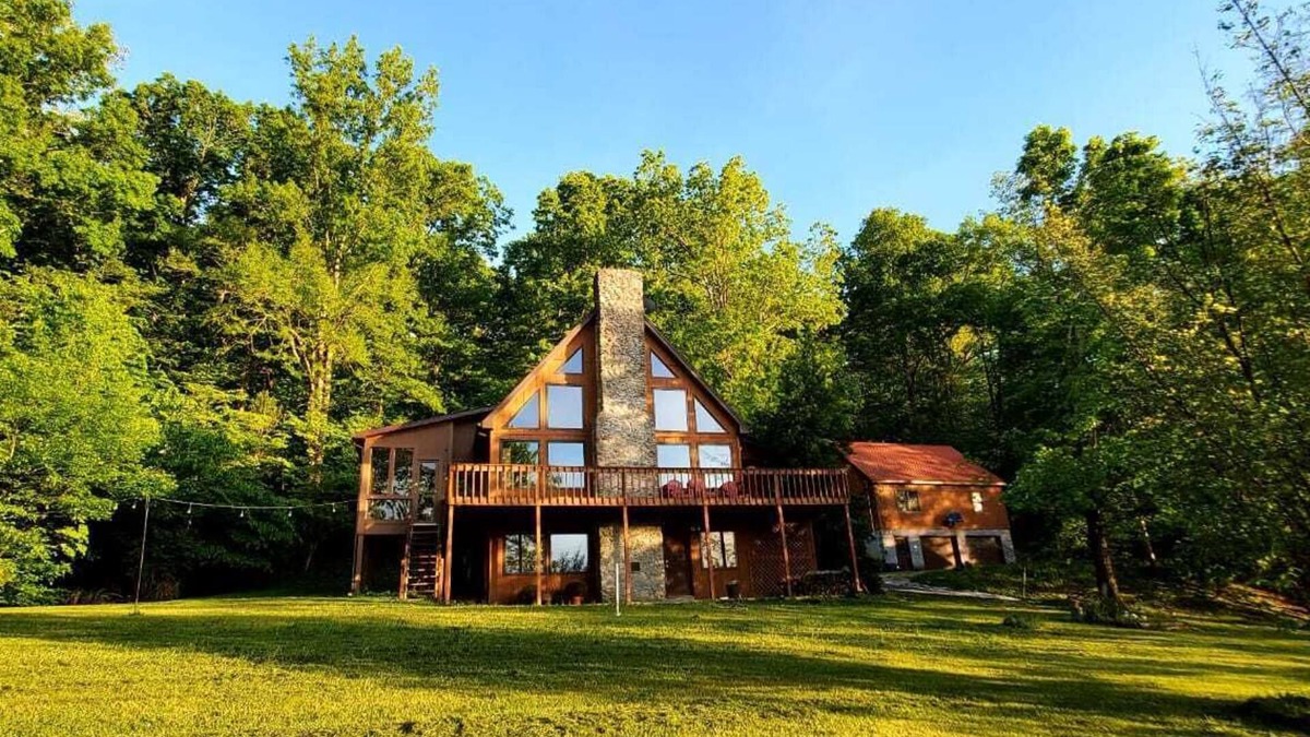 Irvine House | Relax & Recharge A Frame Retreat firepit hot tub sauna gym fishing forest escape