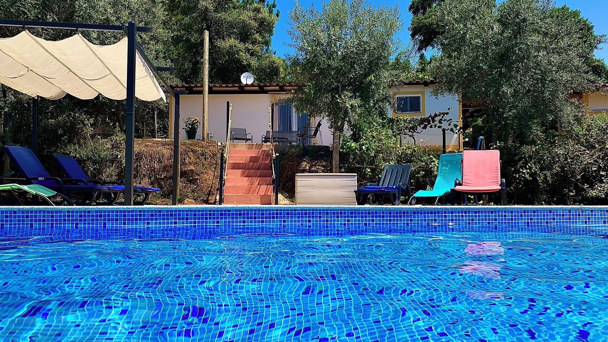 Serta House | Relax, swim and unwind at this Portuguese house 5 minutes from Sertã, Portugal.