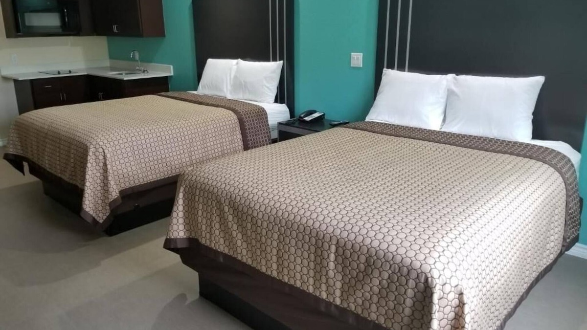Bay City Hotel | Relaxing Two Queen Bedroom and Kitchenette in Quiet Bay City Location, 2 Units
