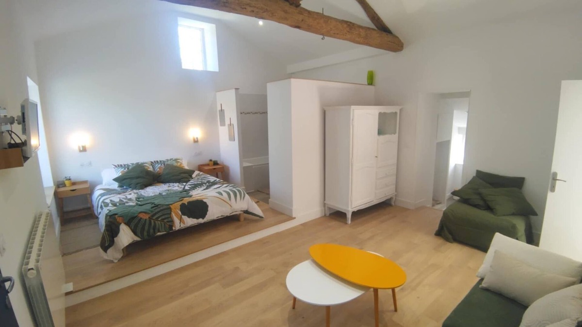 Monsireigne House | Renovated farmhouse guestroom with private terrace and lake view