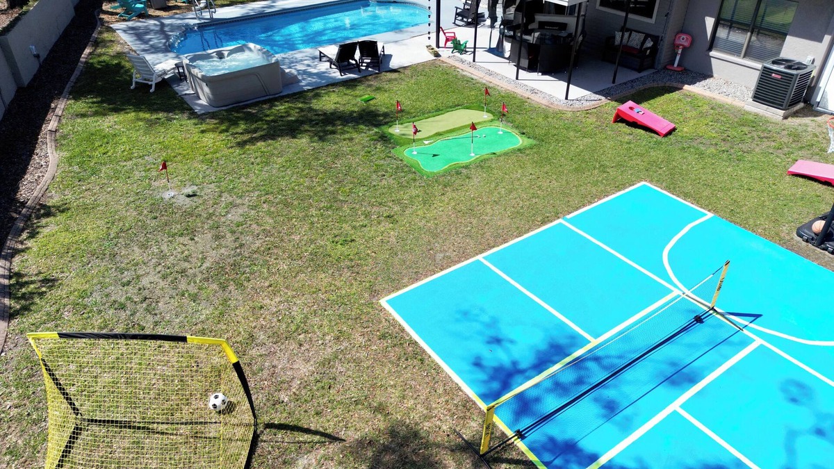 Citrus Park House | Resort Backyard: Pool, Hot Tub, Pickleball, Basketball & Game Room Fun!