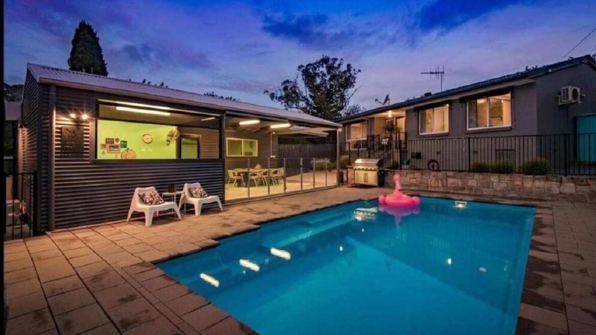 Hughes House | Resort style home pool spa sauna