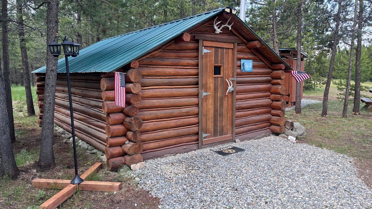 Marion Cabin | Retreat to our cozy cabin nestled in a private hideaway.nSolar lights & shower