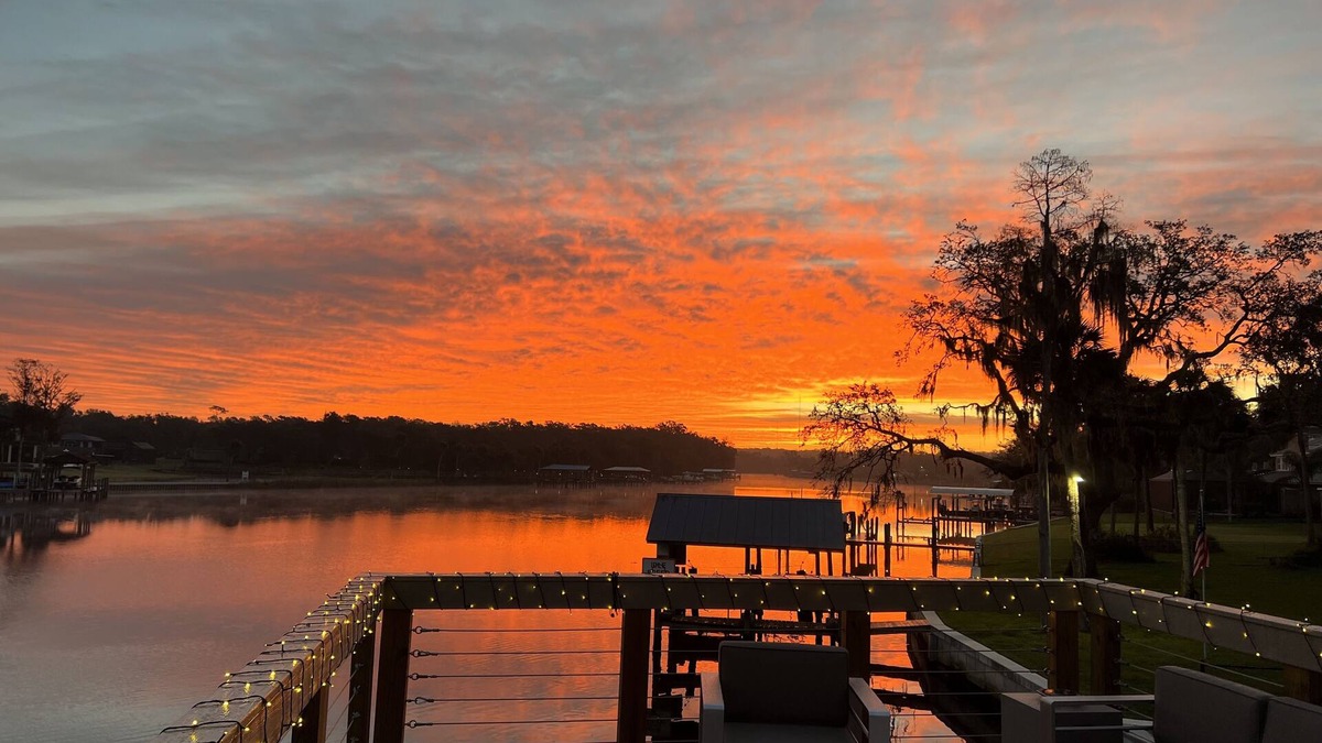 Riverview House | River House w/2-story dock, boat ramp, fire pits outdoor lounge area.