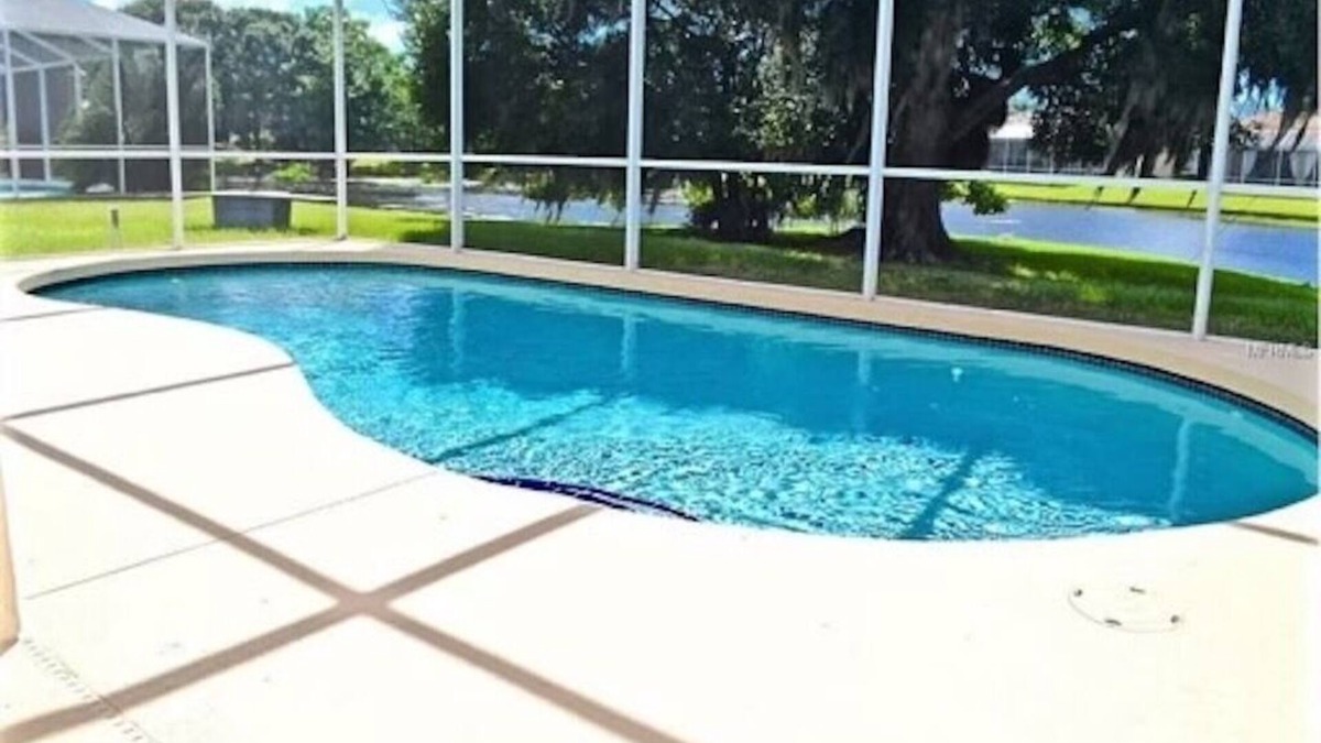 River Pointe House | River Pointe Lakefront 3 BR Ranch Home with Heated Pool