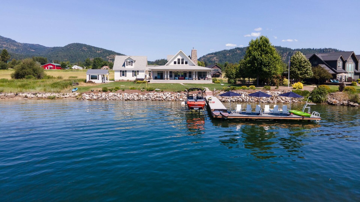 Laclede House | Riverfront custom home with private dock, hot tub, firepit, game room, grill, AC