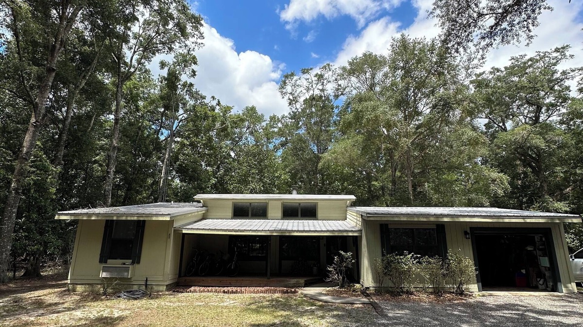 High Springs House | Riverfront Forest Retreat - Near Springs & UF! 3BR/2BA on the Santa Fe River!