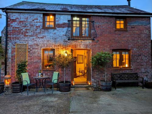 Llangadog House | Romantic Country Cottage with log burner, garden patio, outdoor tub and country views- Brecon Beacons National Park