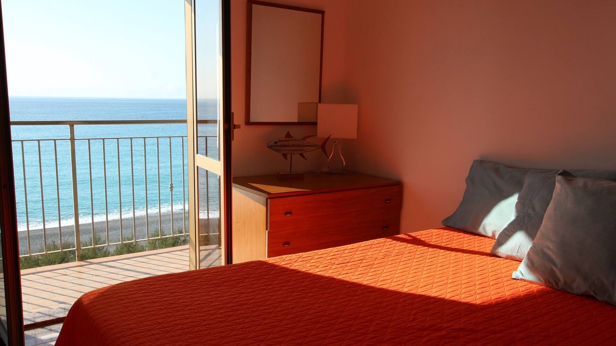 Annunziata Apartment | Romantic flat on the beach, sunset sea view, free parking, WIFI, TV