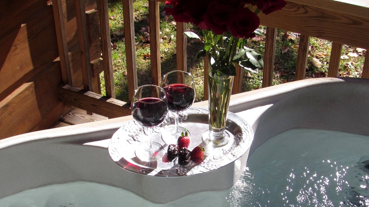 Hot Springs Cabin | Romantic Pet Log Cabin with hot tub, waterfall, wifi, gas grill, firepit creek