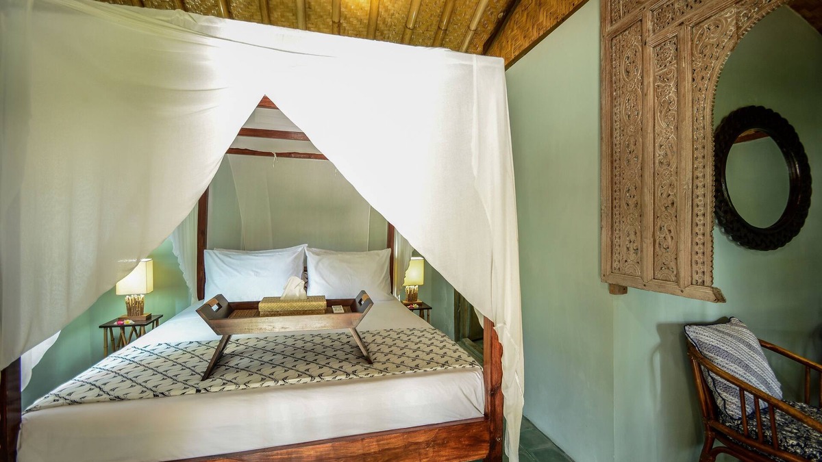 Jasri Resort | Romantic Private Villa facing the pool.Soft aqua handmade tiles and antiques.