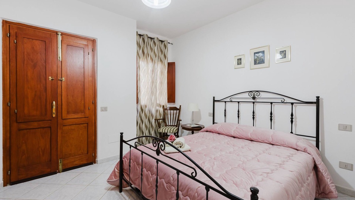 Palmas Arborea Apartment | Room 'Camera 1' with Shared Terrace, Wi-Fi and Air Conditioning