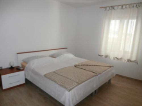 Gornje selo House | Room in Susak with air conditioning, W-LAN (3865-4)