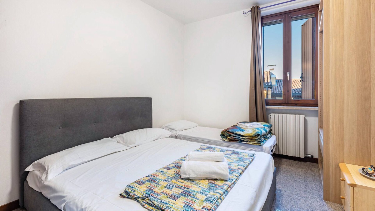 Pizzoletta Apartment | Room 'Tripla Budget' with Shared Terrace, Wi-Fi and Air Conditioning