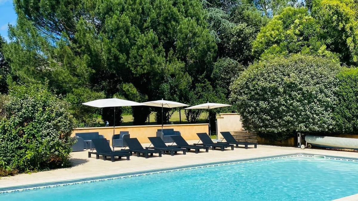 Berbiguieres House | Rose gite at Laugerie Basse Gites, with a beautiful heated pool and grounds