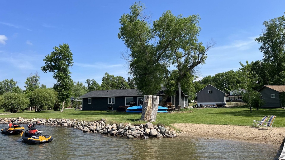 Ottertail House | ROUND LAKE LAKE HOUSE Beautiful lake home on the water with sandy beach