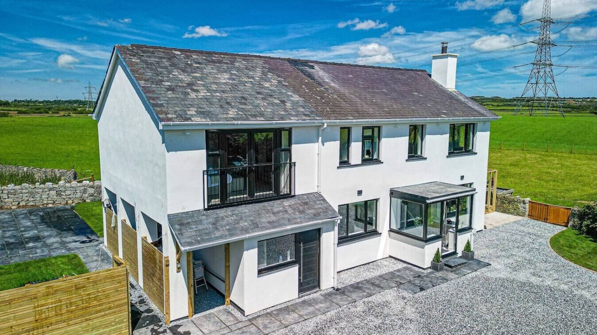 Llangefni House | Rural Hideaway with Hot Tub, Orchard & Games Room