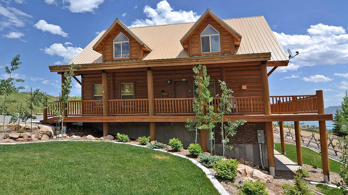 Harbor Village Cabin | Rustic cabin with lake views from deck w/grill, foosball, W/D, fireplace