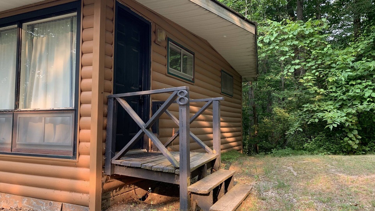 Palmyra Cabin | Rustic cabins in secluded campground with lake access and woods to wander in.