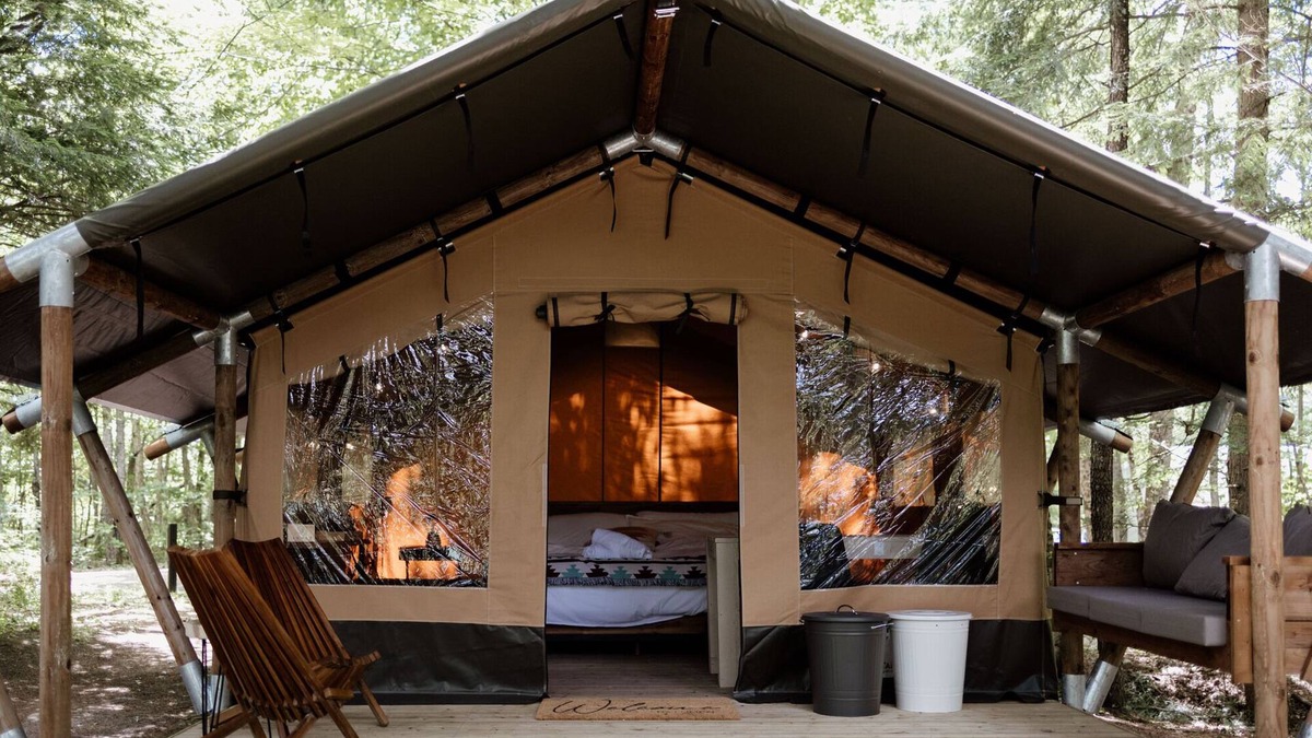 Woodstock RV Rental | Safari Tent Site 4 | 1 King Bed | Pond View