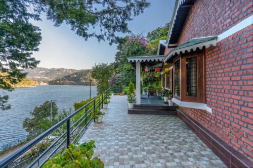 Bhimtal Villa | SaffronStays Gardens On The Lake, Bhimtal - pet-friendly garden villa by the lake