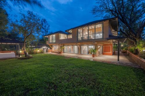 Wai Villa | SaffronStays Red Brick House, Panchgani - rustic villa with huge lawn and terrace