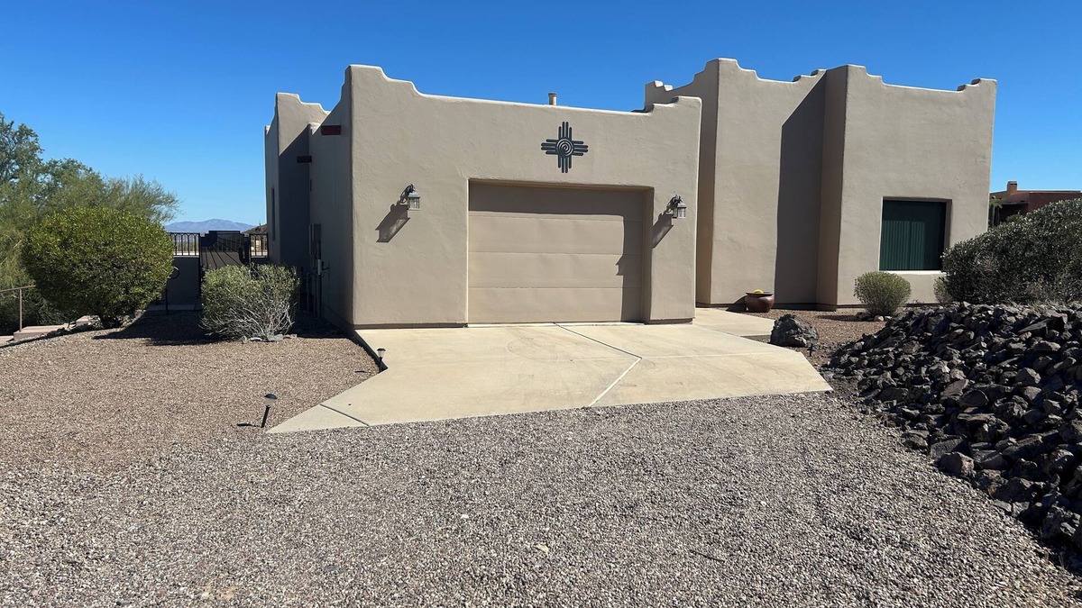Tucson House | Saguaro Studded City and Mountain Views in the Tucson Mountain foothills.