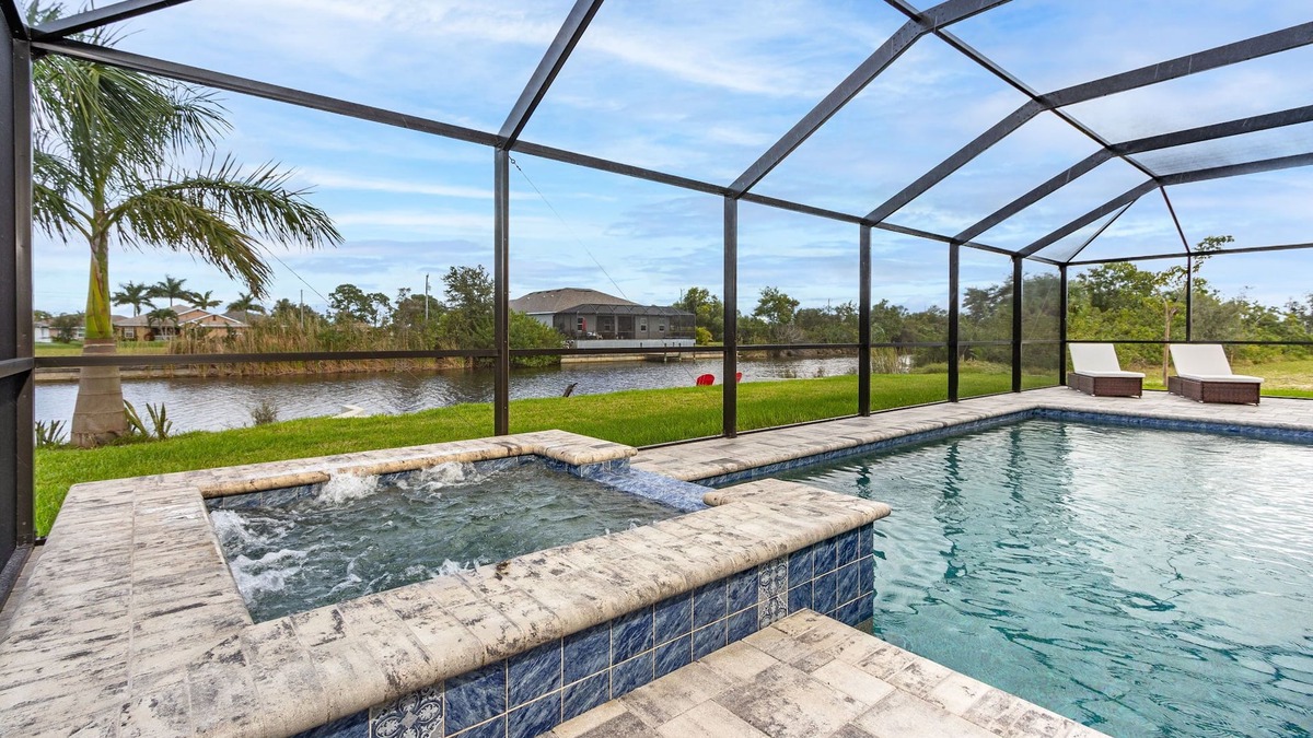 Burnt Store House | Salt water pool home with hot tub on fresh water canal and 40 foot pier 🌴