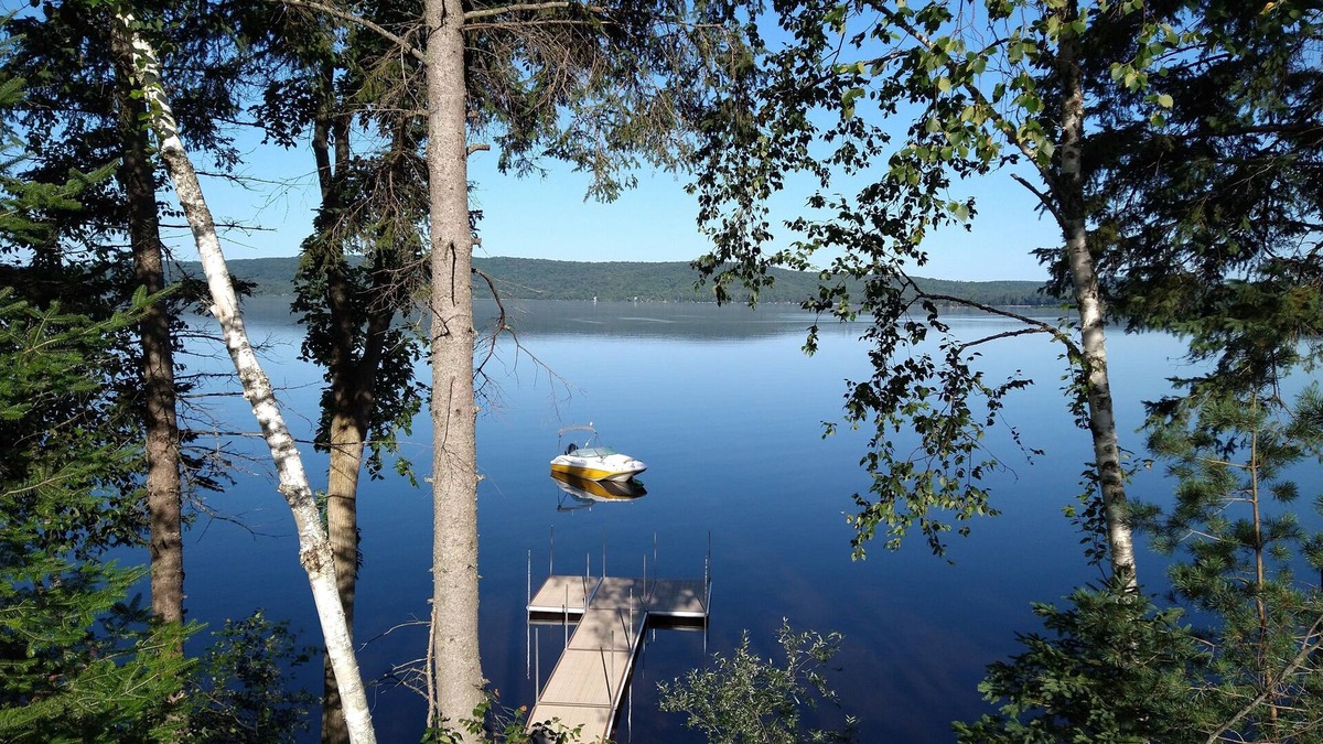 Kearney House | Sand Lake cottage - lake views, sunsets, easy snowmobile and ATV trail access