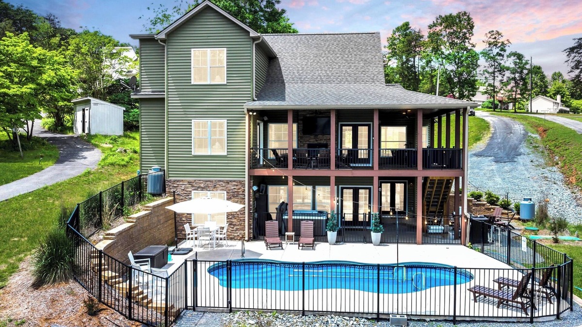 Moneta House | Sandy Bottom Cove, New Lakefront Luxury w/Covered Decks + Heated Salt Pool, Beach, Hot Tub, Dock!