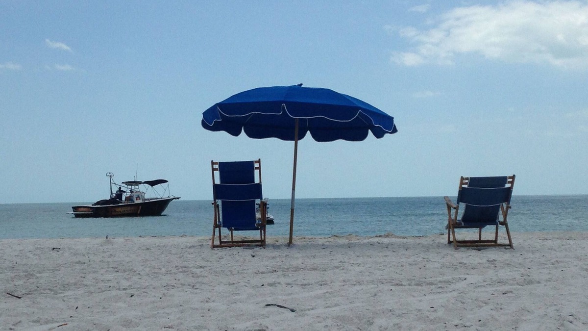 South Island Condo | Sandy, white beaches right outside your door! Relax and let the good times roll!