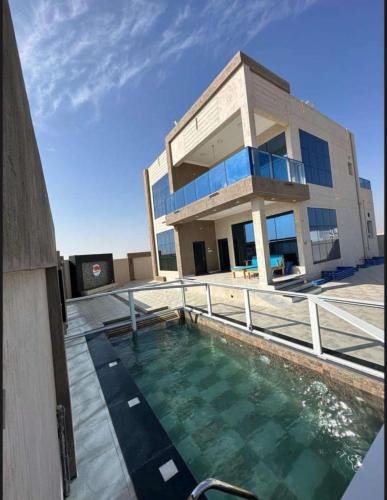 Al Hadd Ski Chalet | Santorini chalet شاليه سانتوريني