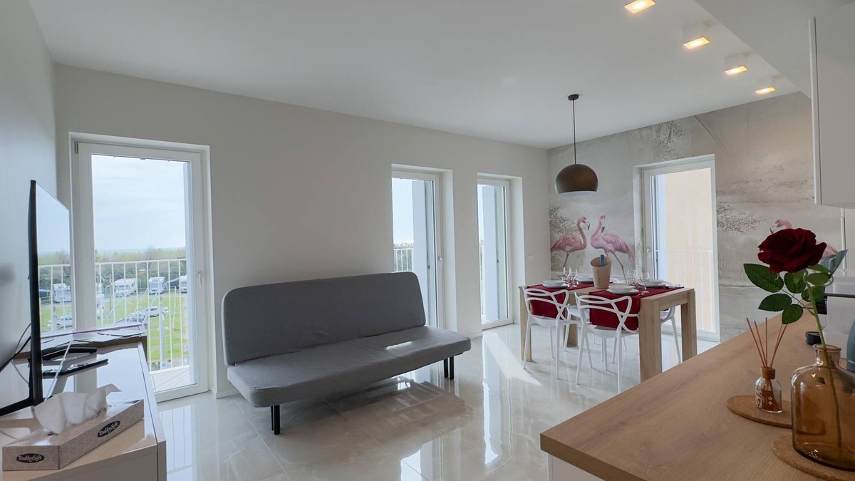 Chioggia Apartment | Seafront Modern Flamingo Suite by Ca-sa Check