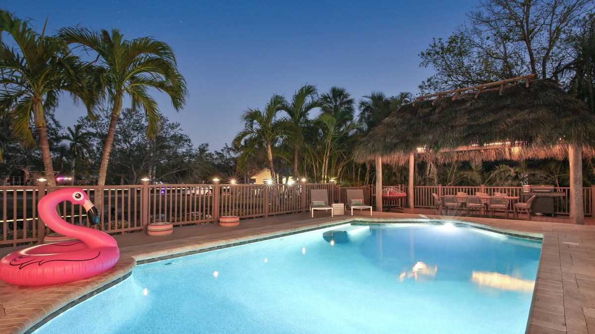Palma Sola House | Seaside Sanctuary - 10 min to the beach, heated pool, water view, billiards