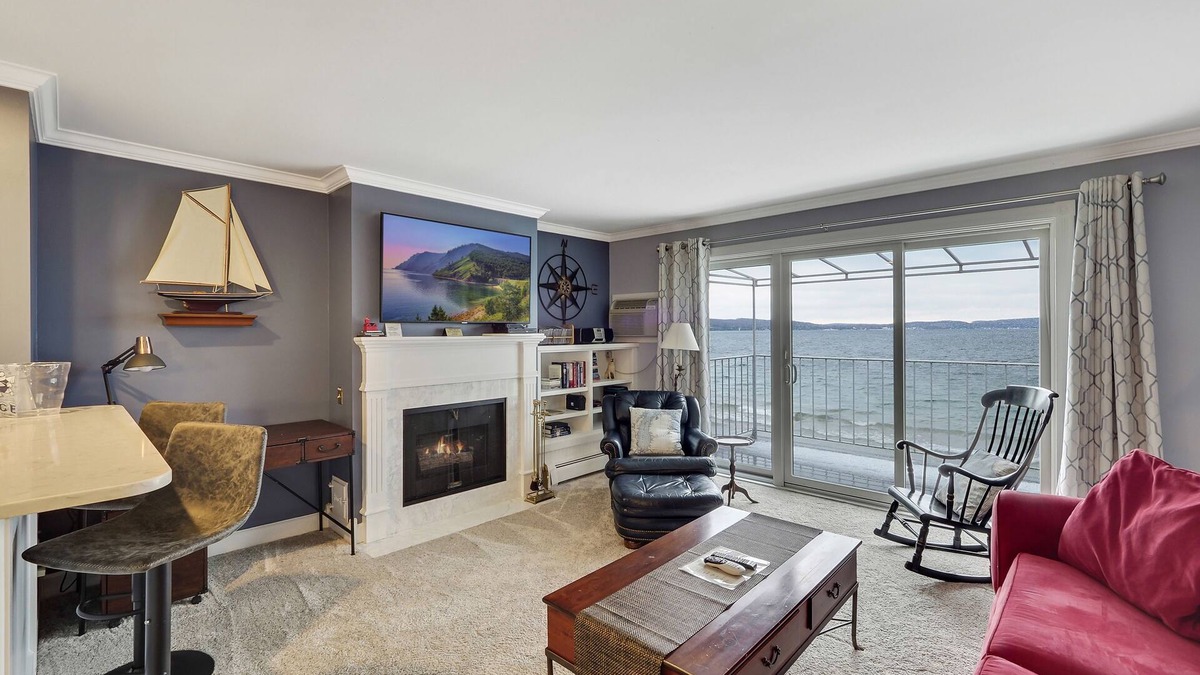 Boyne City Condo | Second-Floor Serenity | Lake Charlevoix Beachfront + Patio | Fireplace |