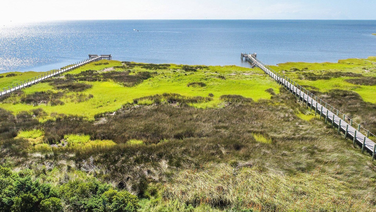 Wind Over Waves House | Semi-Soundfront Home w/Private Pool, Hot Tub, Game Room, & Community Boat Ramp
