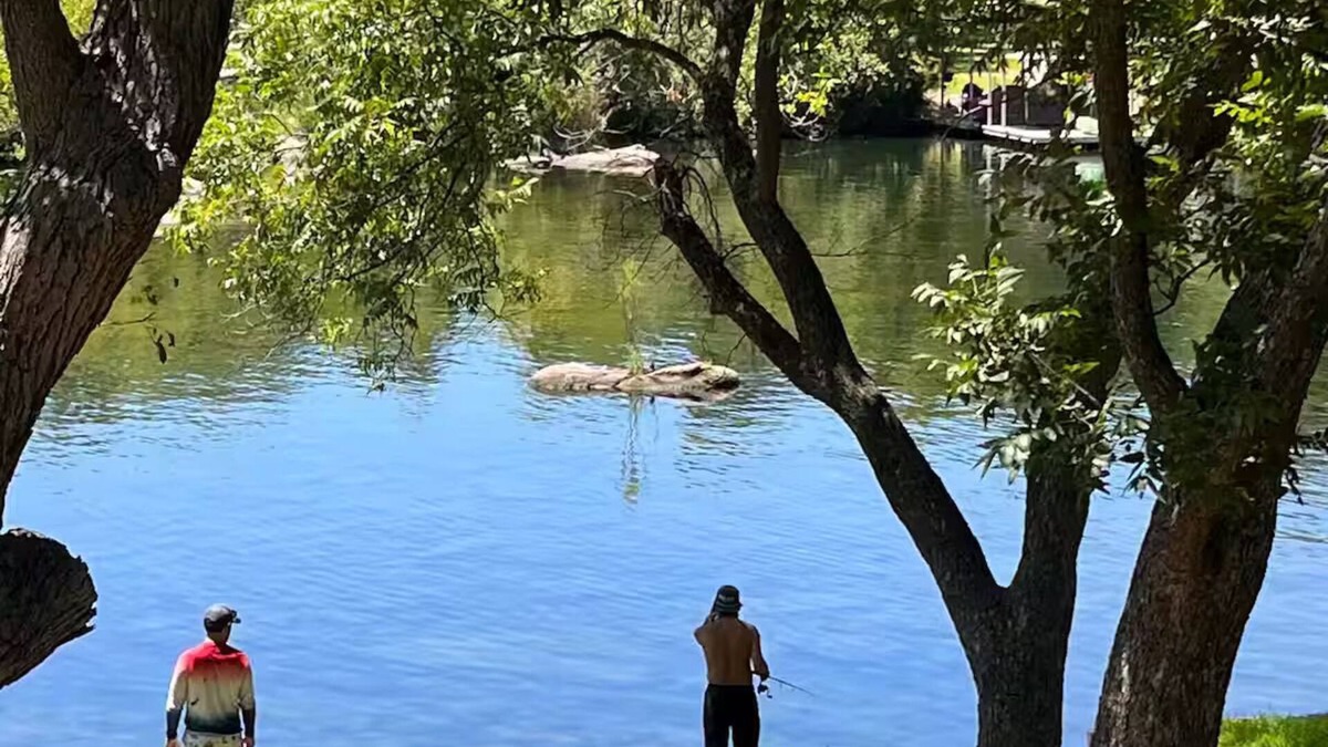 Burnet House | Shaded riverfront getaway. Dog friendly