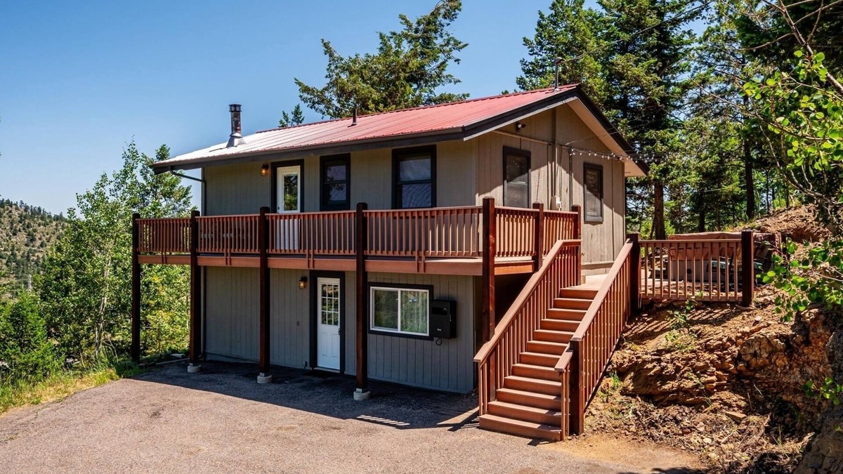 Evergreen House | Sky Mountain Retreat. Escape to the serene winter beauty of Evergreen, Colorado