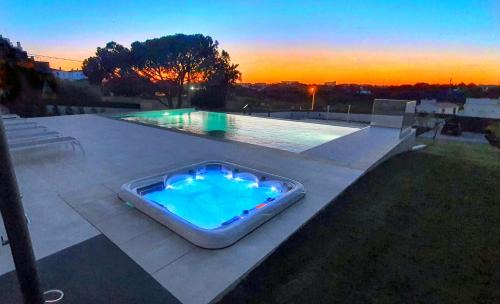 Olhos D'Agua Villa | Sky Villa by Laranjal Rentals